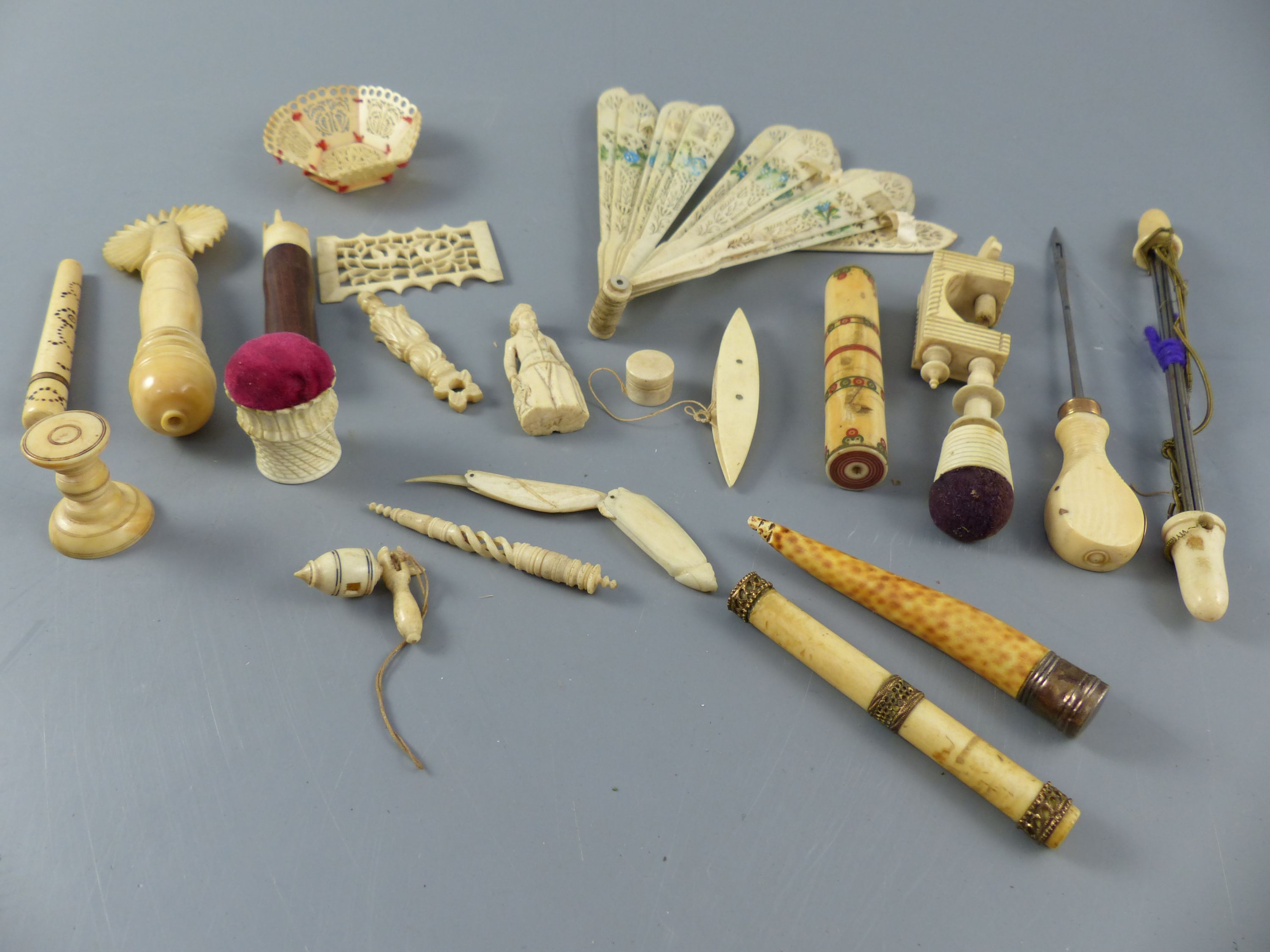 A group of assorted 19th century ivory sewing implements and objets dart